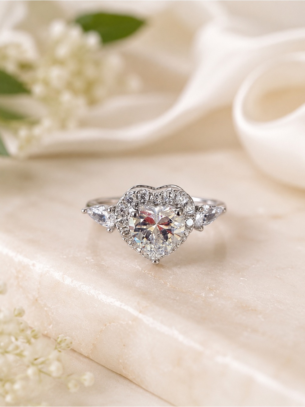 Heart-Shaped Halo Ring in Silver with Sparkling Center Stone